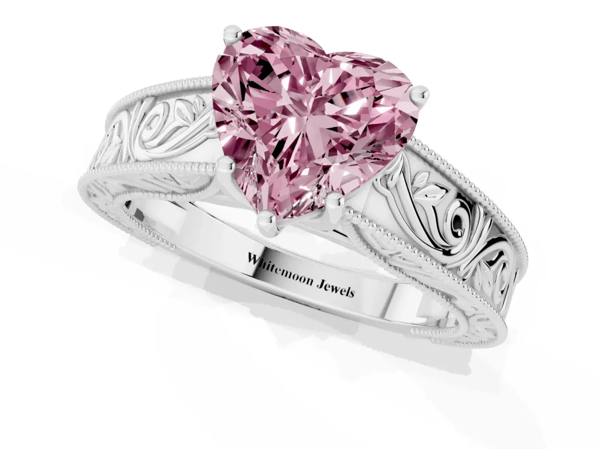 Fancy Pink Heart Cut Diamond Solitaire Ring with Engraved Band and Four-Prong Setting Platinum