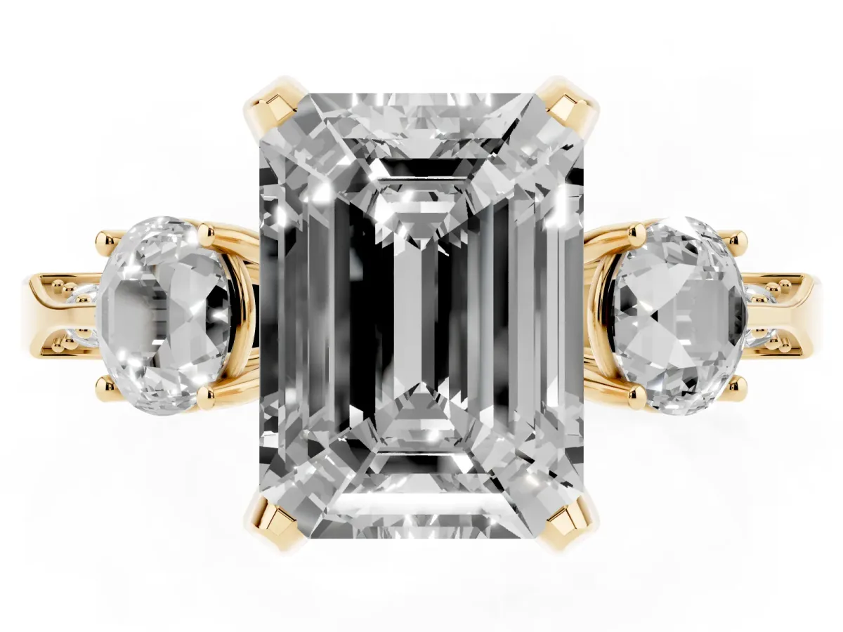 Fancy Pink Emerald Cut Brilliant Three-Stone Diamond Ring with Pavé Band and Four-Prong Setting Yellow gold