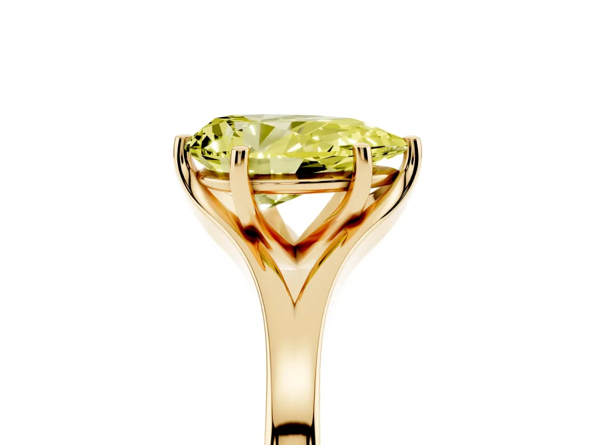 Fancy Yellow Pear Cut Solitaire Diamond Ring with Six-Prong Setting and Tapered Band Yellow gold