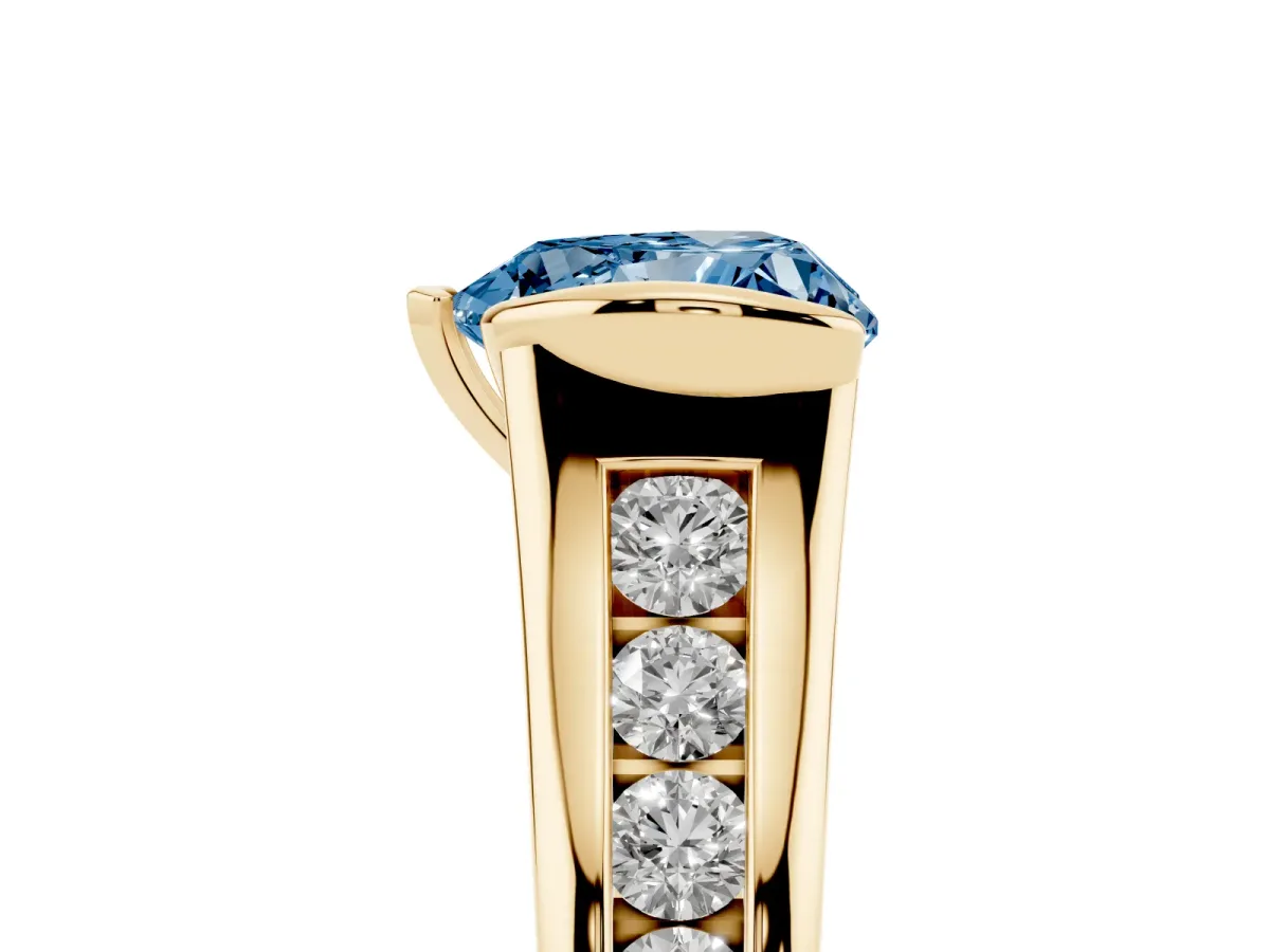 Fancy Blue Heart Cut Solitaire Bezel-Set Diamond Ring with Channel-Set Band Yellow gold