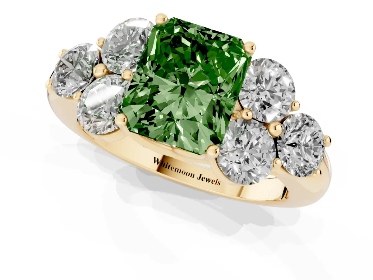 Fancy Green Radiant Cut Cut Diamond Cluster Ring with Round Accent Stones and Prong Setting on a Classic Band Yellow gold