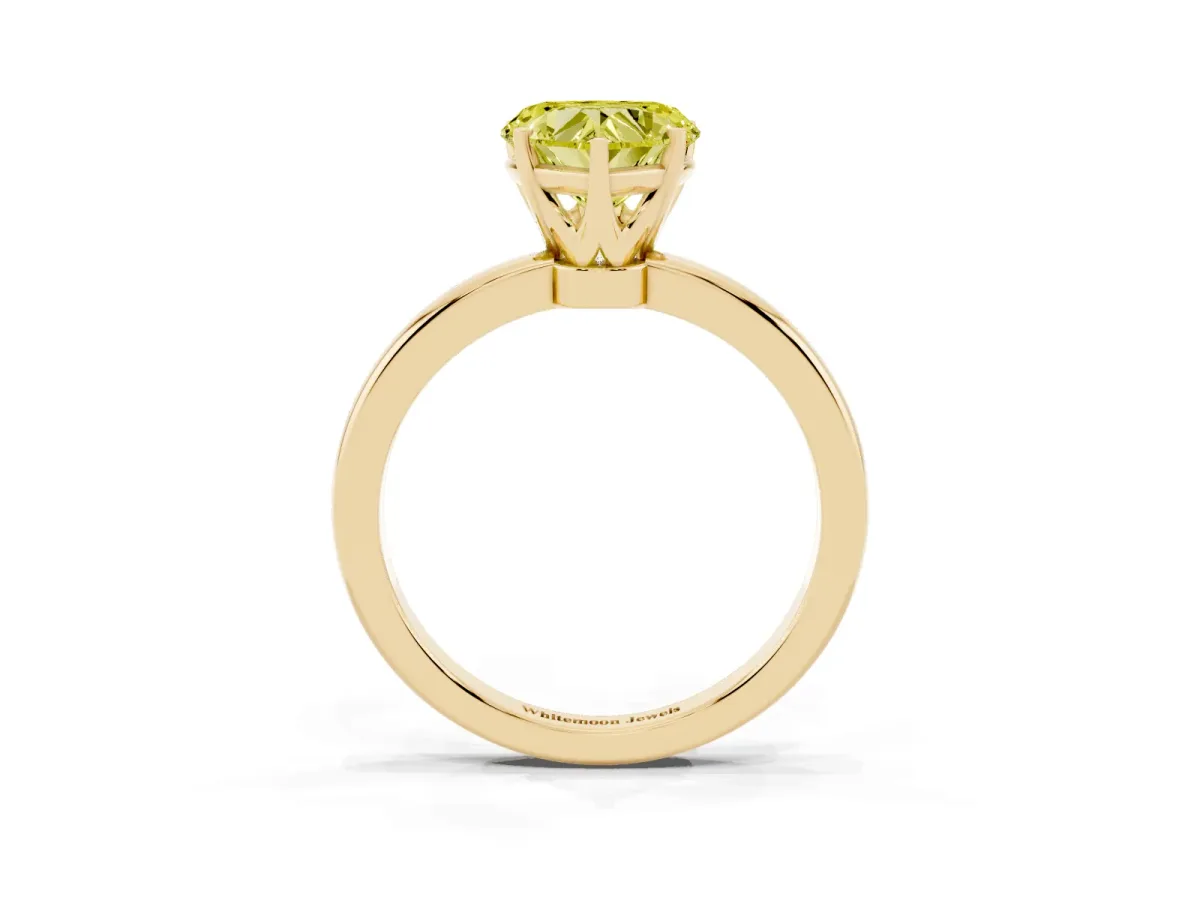Fancy Yellow Heart Cut Solitaire Diamond Ring with Six-Prong Setting on a Classic Band Yellow gold