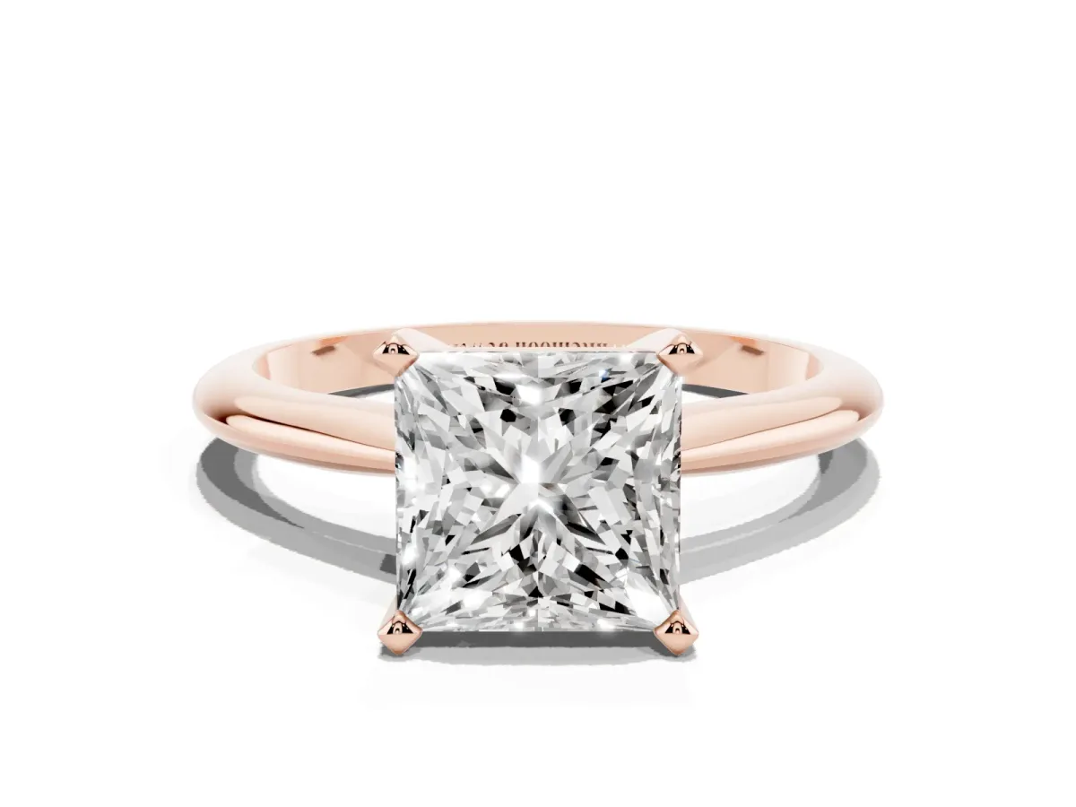 Princess Cut Cut Solitaire Ring with Four-Prong Setting on a Classic Band Rose gold