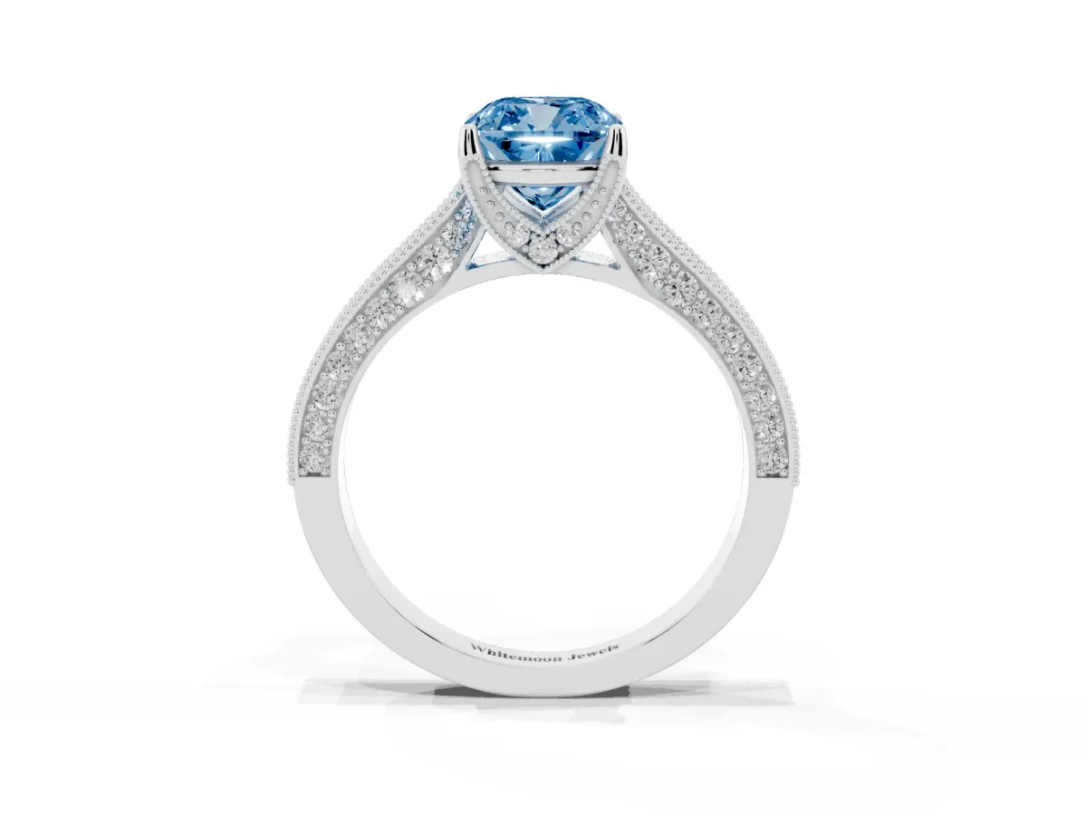 Fancy Blue Cushion Cut Cut Diamond Solitaire Ring with Milgrain Pave Band and Four Prong Setting Silver