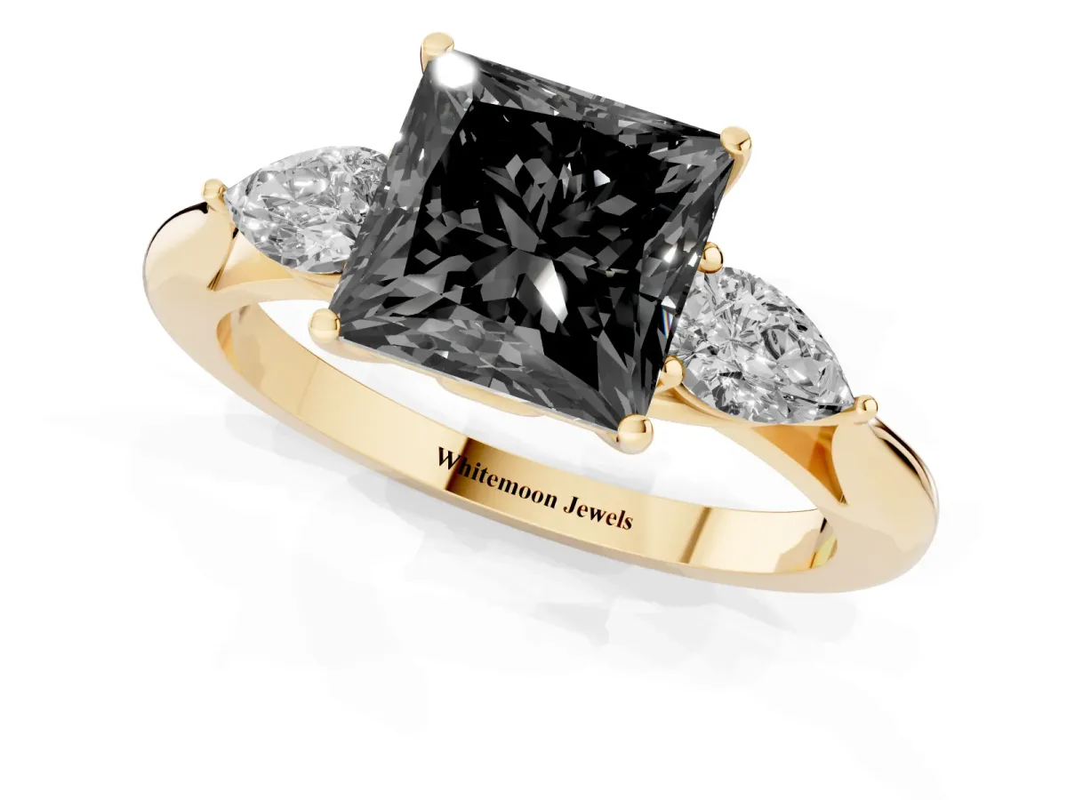 Fancy Black Princess Cut Diamond Three-Stone Ring with Pear Side Stones and Prong Setting Yellow gold