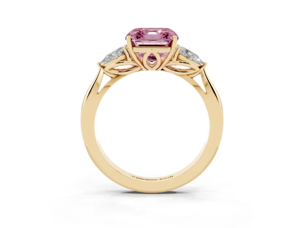 Fancy Pink Three-Stone Asscher Cut Diamond Ring with Pear Side Stones in Four-Prong Setting Yellow gold