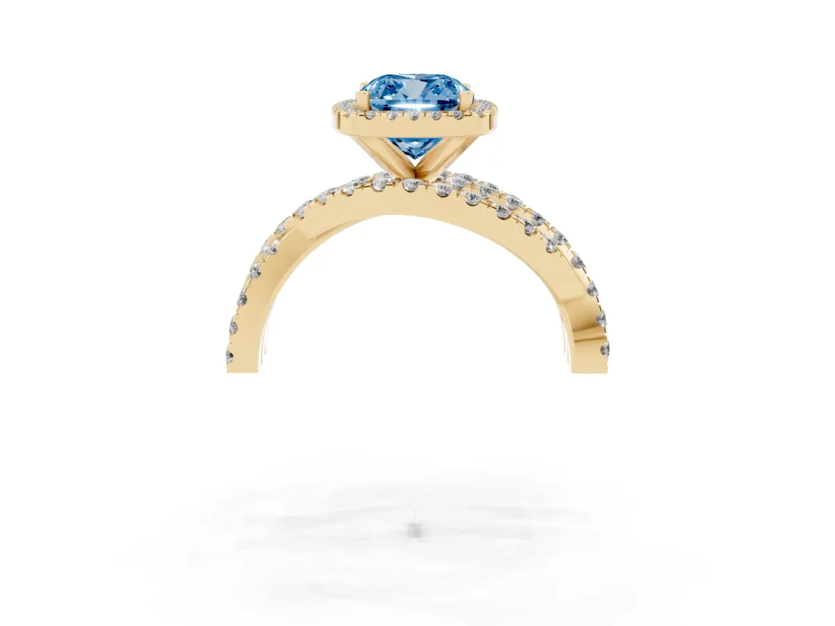 Fancy Blue Cushion Cut Diamond Halo Ring with Round Split Shank and Prong Setting Yellow gold