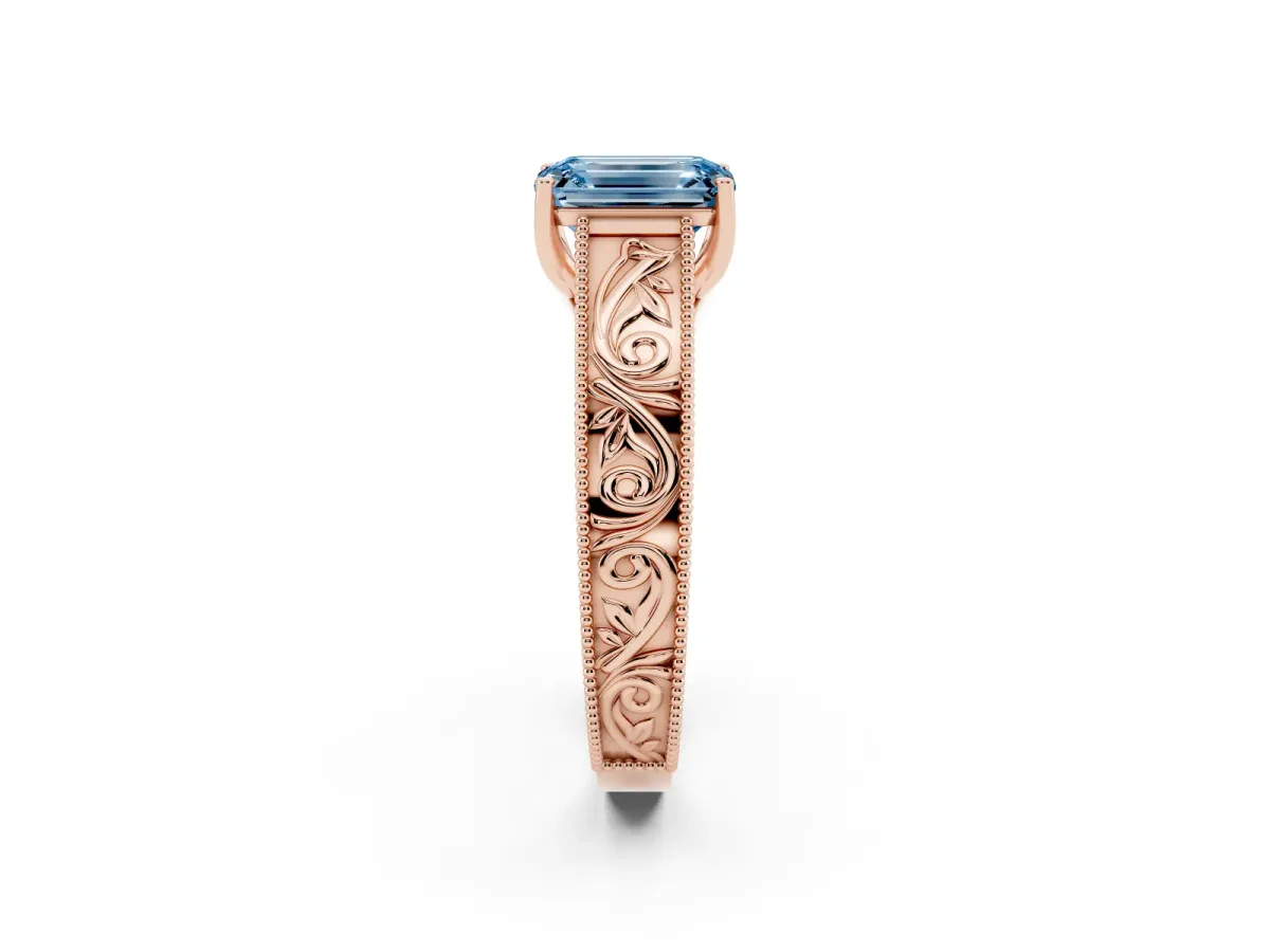 Fancy Blue Emerald Cut Diamond Solitaire Ring with Engraved Band and Four-Prong Setting Rose gold