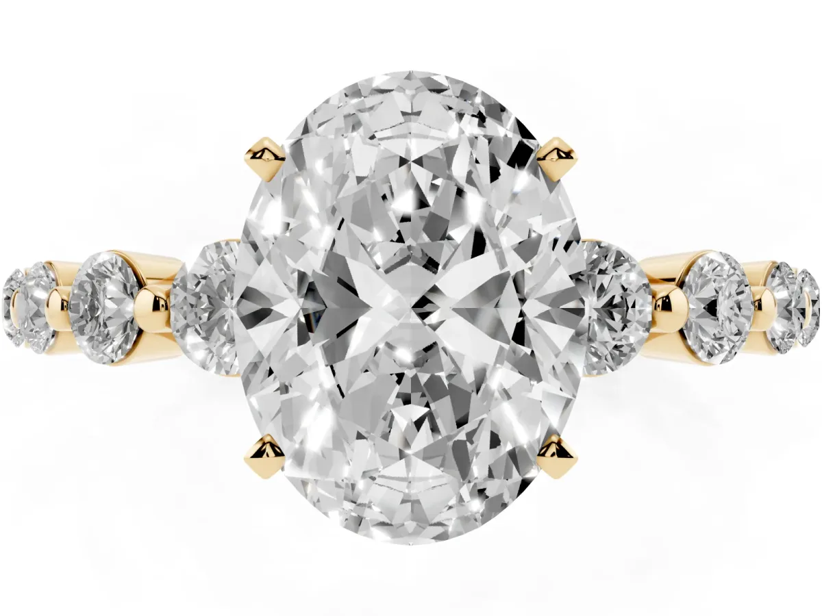 Oval Cut Solitaire Diamond Ring with Pave Band and Four-Prong Setting Yellow gold