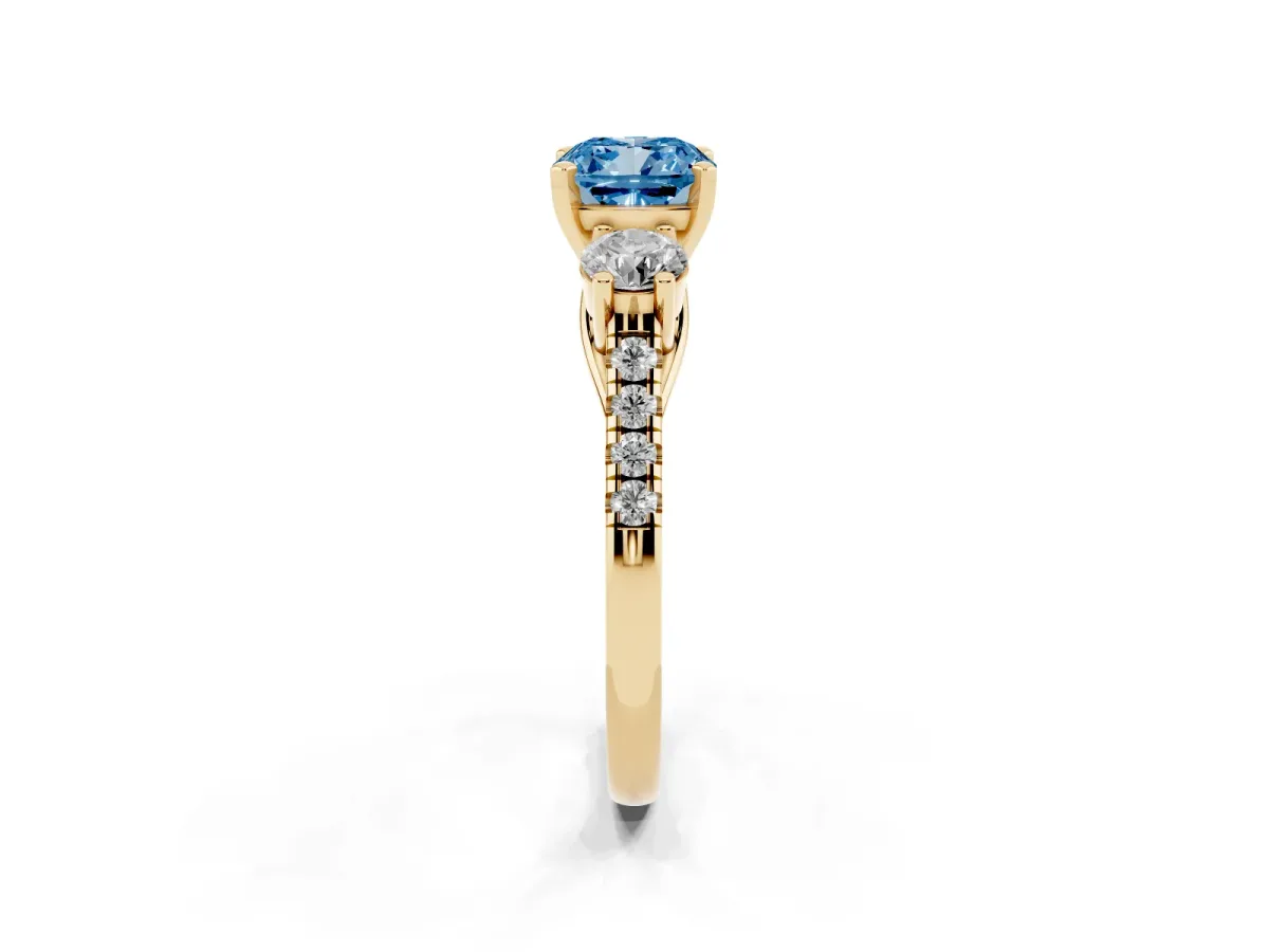 Fancy Blue Three-Stone Cushion Cut Diamond Pavé Band with Four-Prong Setting Yellow gold