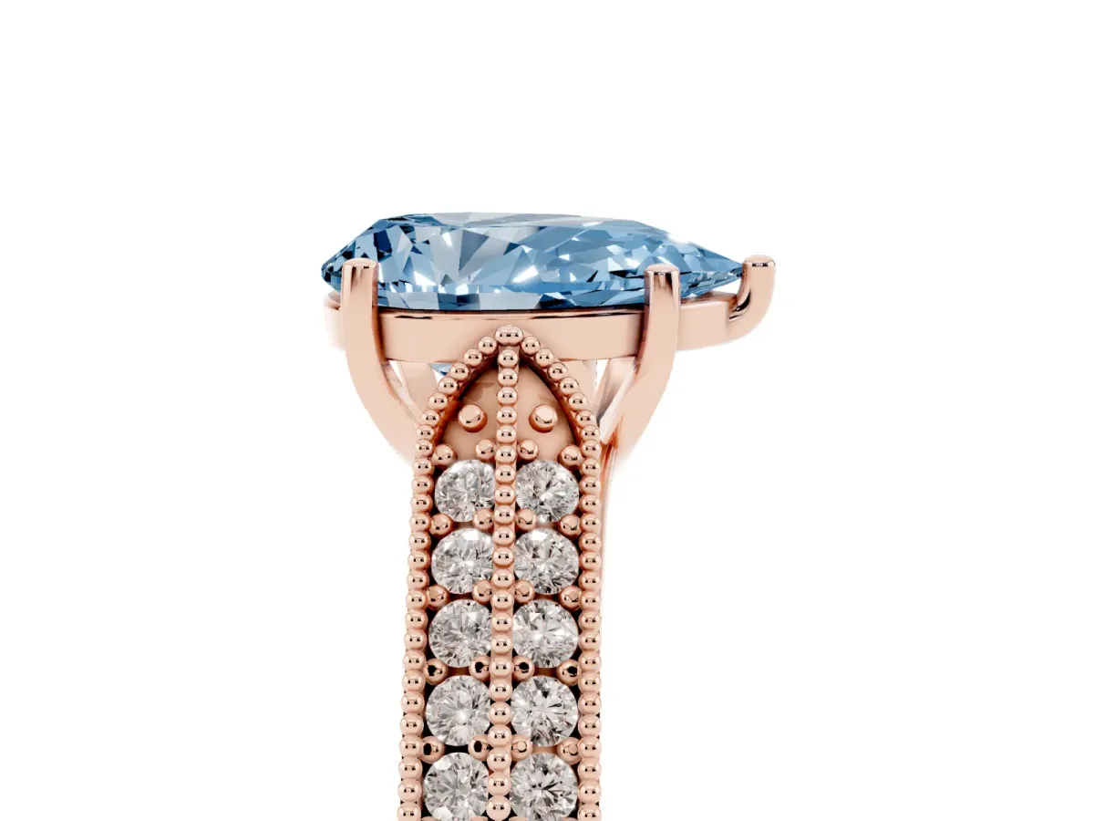 Fancy Blue Pear Cut Cut Pave Split Shank Engagement Ring with Four-Prong Setting Rose gold