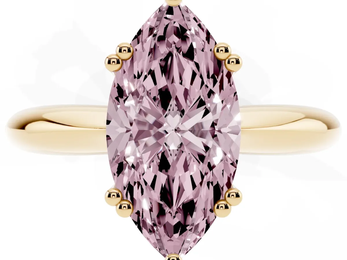 Fancy Pink Marquise Cut Cut Solitaire Engagement Ring with Tapered Band and Four-Prong Setting Yellow gold
