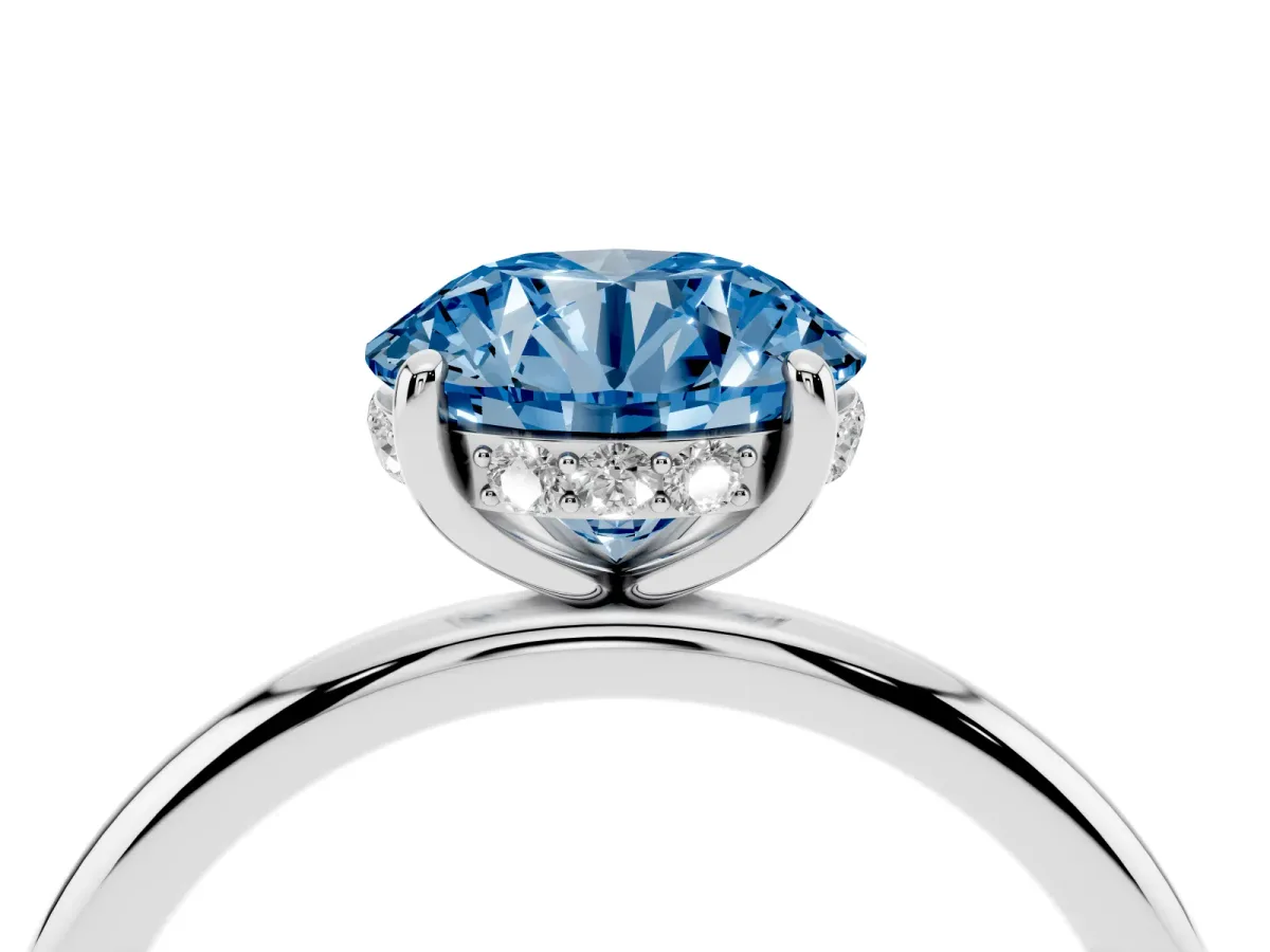 Fancy Blue Round Cut Solitaire Diamond Ring with a Classic Band and Four-Prong Setting Silver