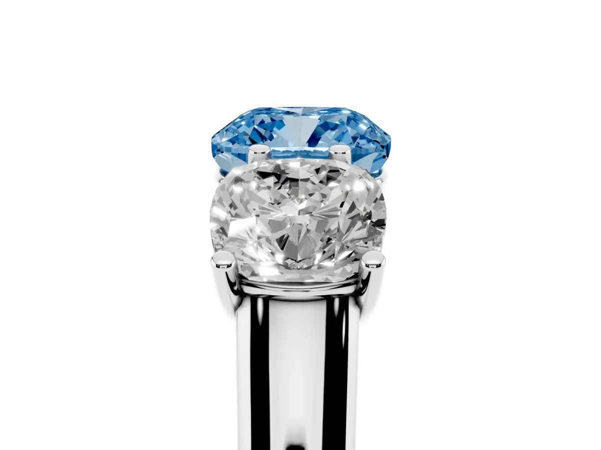 Fancy Blue Cushion Cut Three-Stone Diamond Ring with Prong Setting on a Classic Band Silver