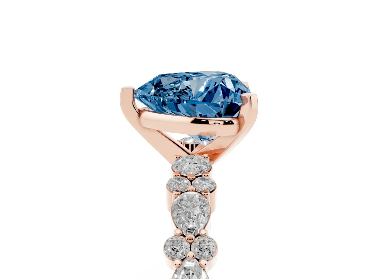 Fancy Blue Heart Cut Diamond Side Stone Solitaire Ring with Round and Four-Prong Setting Rose gold