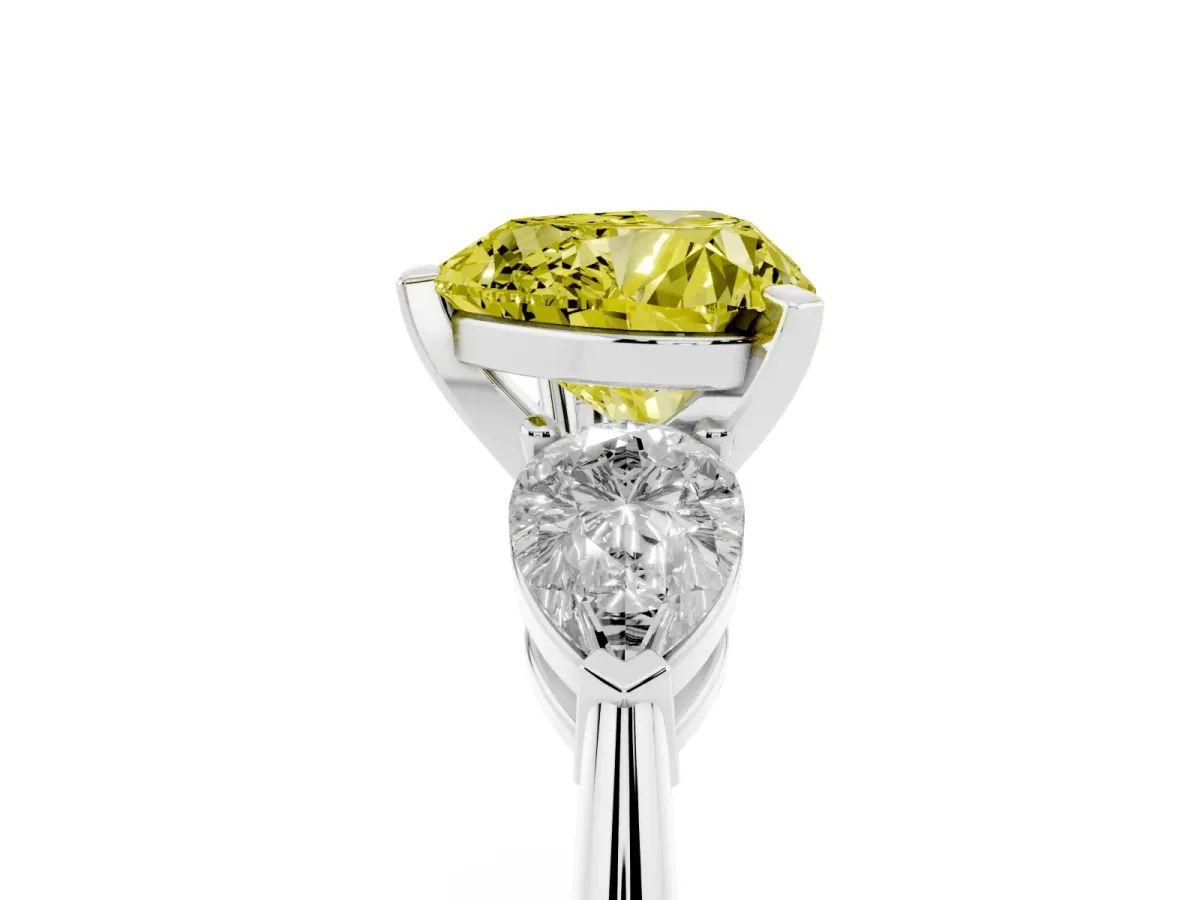 Fancy Yellow Three-Stone Heart Cut Diamond Ring with Pear Side Stones and Four-Prong Setting Silver