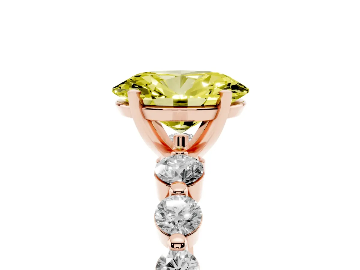 Fancy Yellow Oval Cut Solitaire Diamond Ring with Pave Band and Four-Prong Setting Rose gold