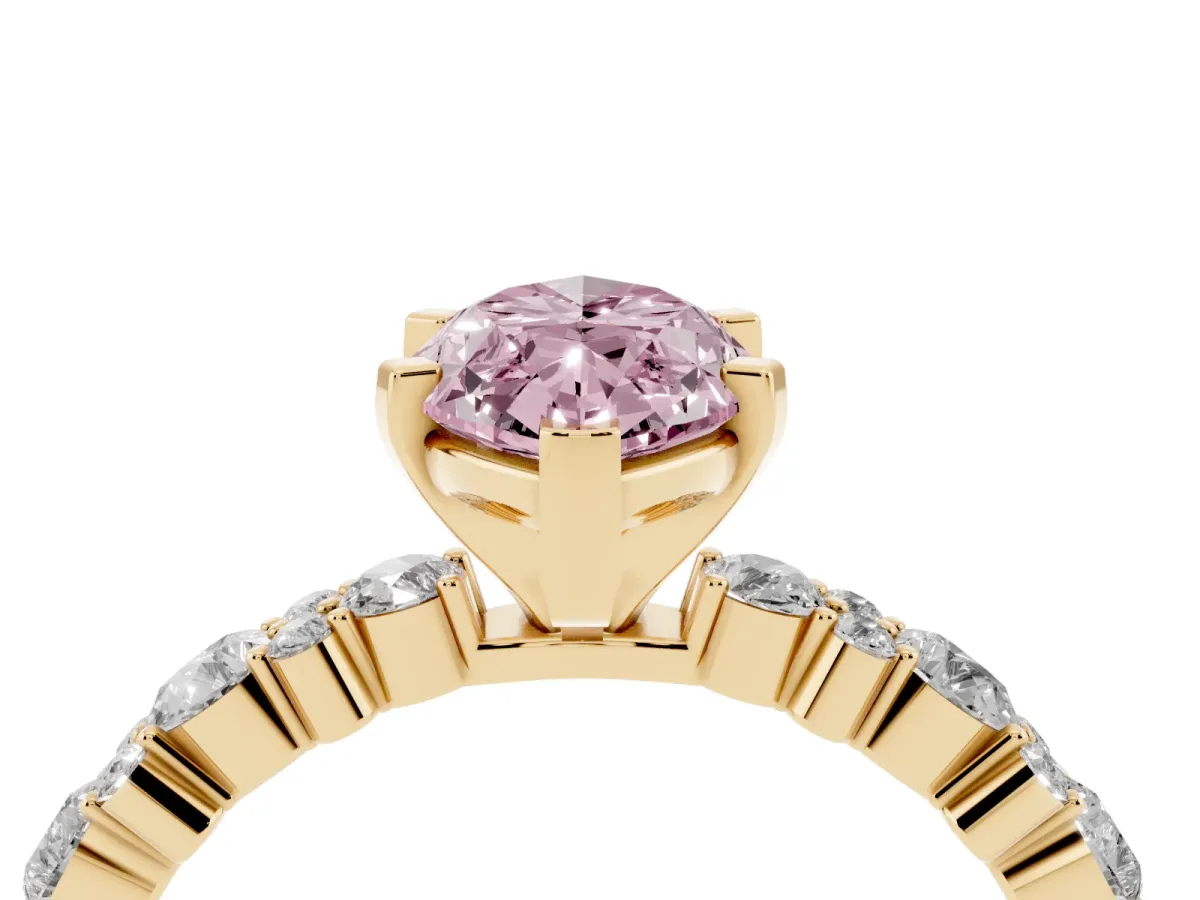 Fancy Pink Marquise Cut Diamond Side Stone Solitaire Ring with Round and Four-Prong Setting Yellow gold