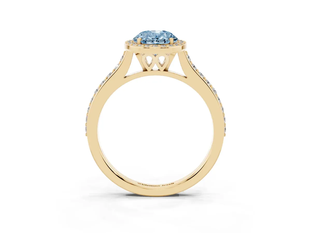 Fancy Blue Oval Cut Diamond Halo Engagement Ring with Round Pavé Shoulders and Prong Setting Yellow gold