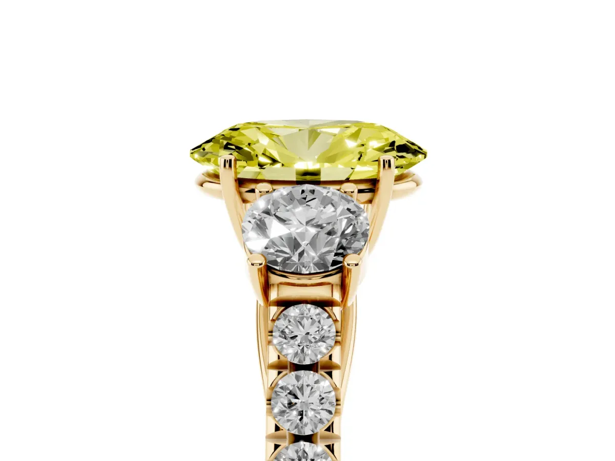 Fancy Yellow Oval Cut Cut Diamond Three-Stone Ring with Round Side Stones and Pavé Band Yellow gold