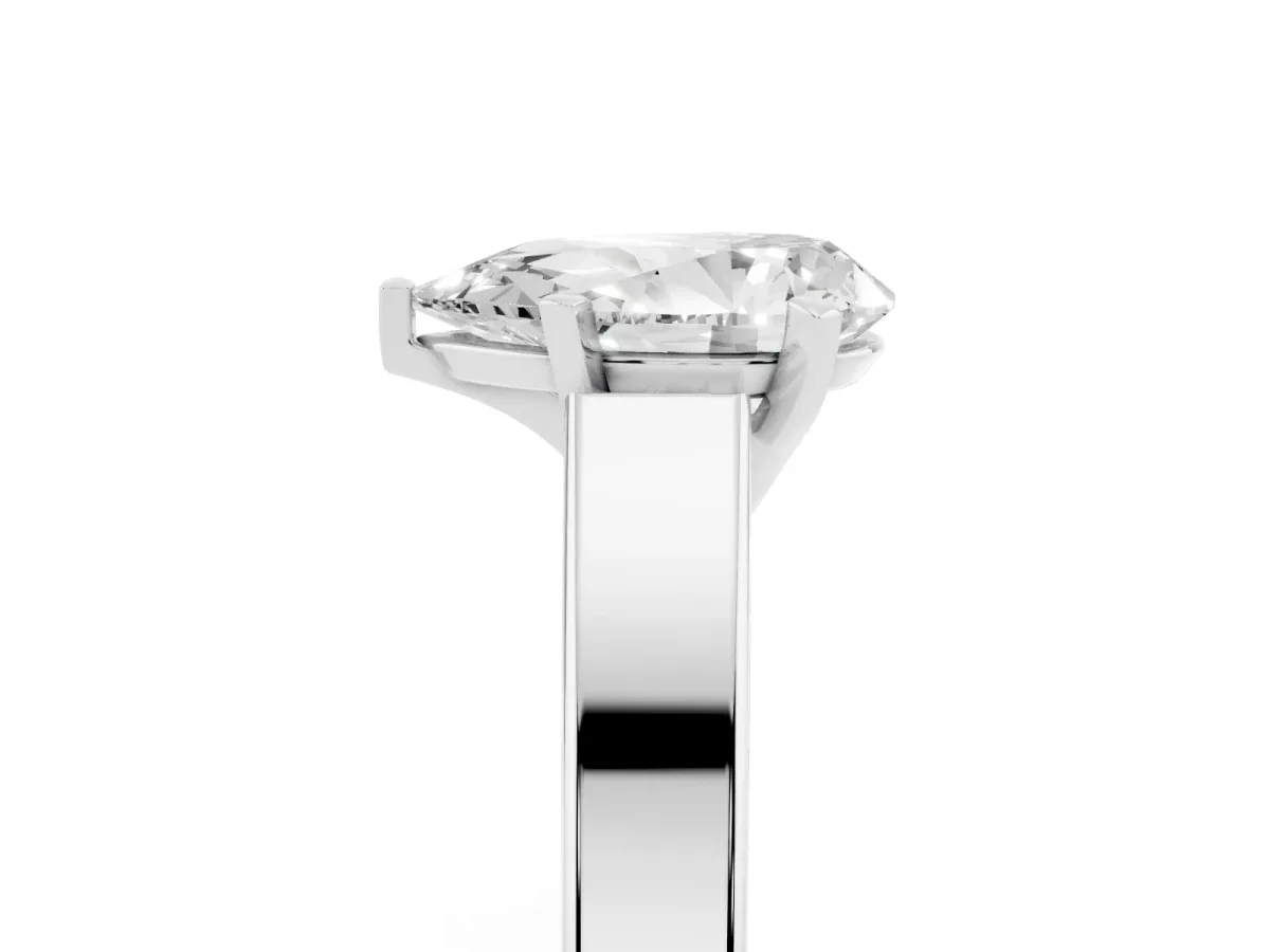 Pear Cut Solitaire Engagement Ring with Four-Prong Setting and Tapered Band Silver