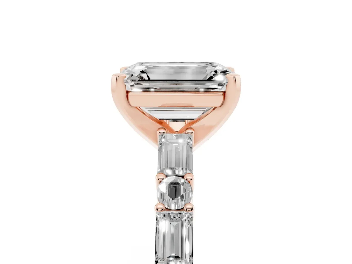 Emerald Cut Diamond Solitaire with Side Baguettes and Channel Set Band Rose gold