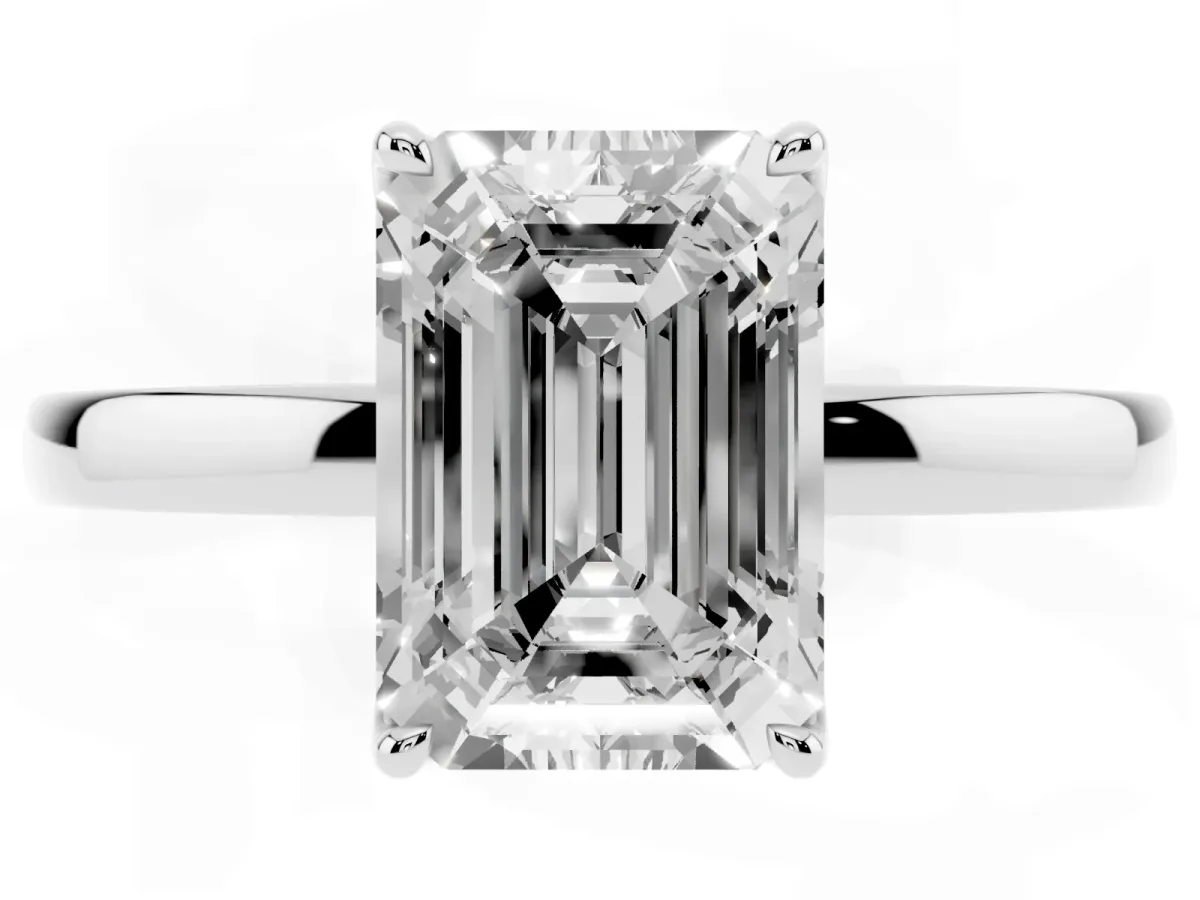 Emerald Cut Diamond Solitaire Ring with Thin Band and Prong Setting Silver