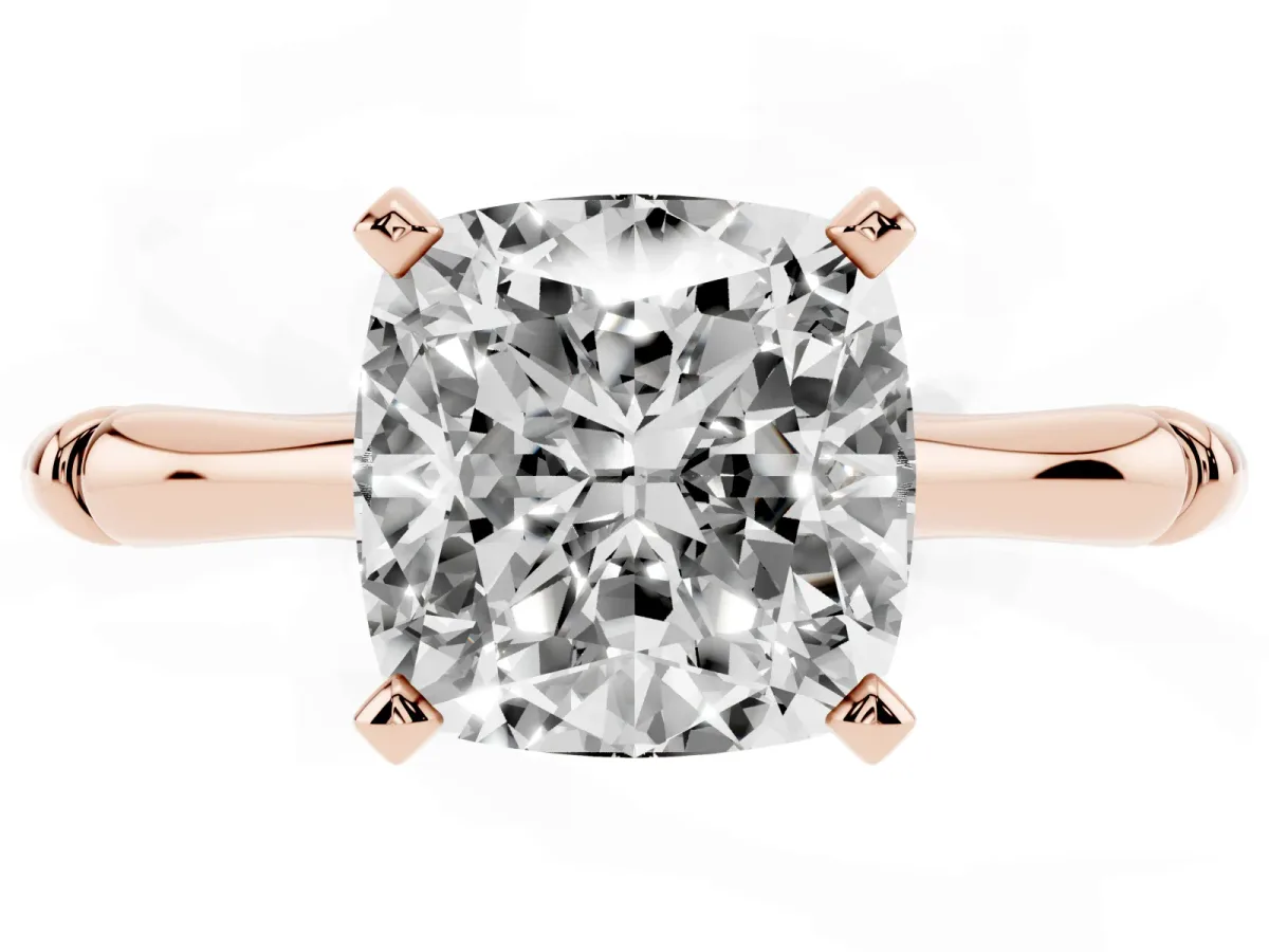 Cushion Cut Solitaire Diamond Ring with Bamboo Band and Four-Prong Setting Rose gold