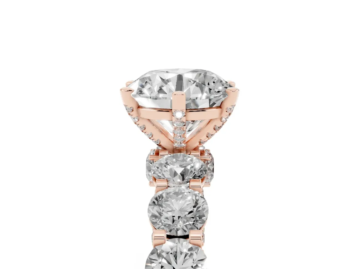 Round Cut Diamond Side Stone Engagement Ring with Four-Prong Setting Rose gold