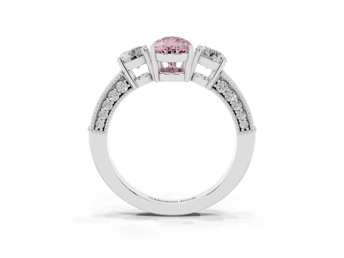 Fancy Pink Pear Cut Three-Stone Diamond Ring with Pavé Band and Four-Prong Setting Silver