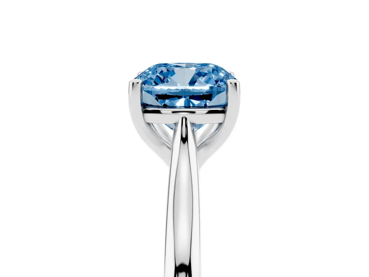 Fancy Blue Cushion Cut Cut Solitaire Ring with Cathedral Band and Four-Prong Setting Silver