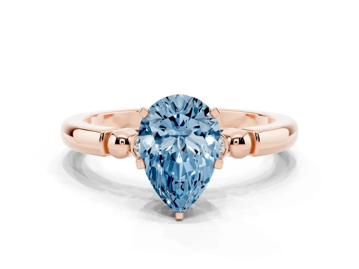 Fancy Blue Pear Cut Solitaire Beaded Band with Four-Prong Setting Rose gold