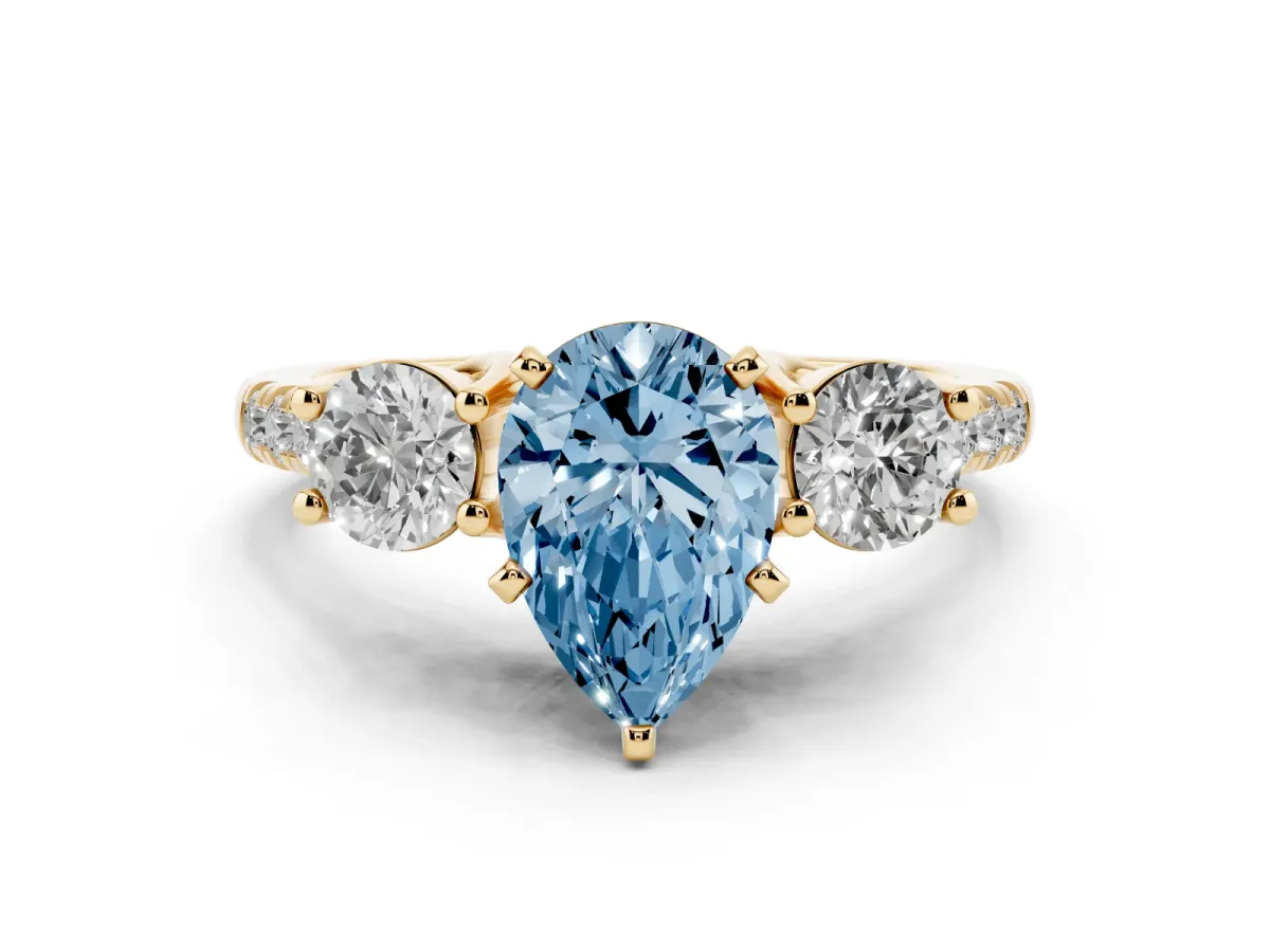 Fancy Blue Three-Stone Pear Cut Diamond Pavé Band with Four-Prong Setting Yellow gold