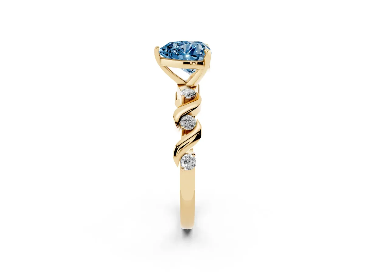 Fancy Blue Heart Cut Diamond Solitaire Twisted Band with Round Accents and Prong Setting Yellow gold