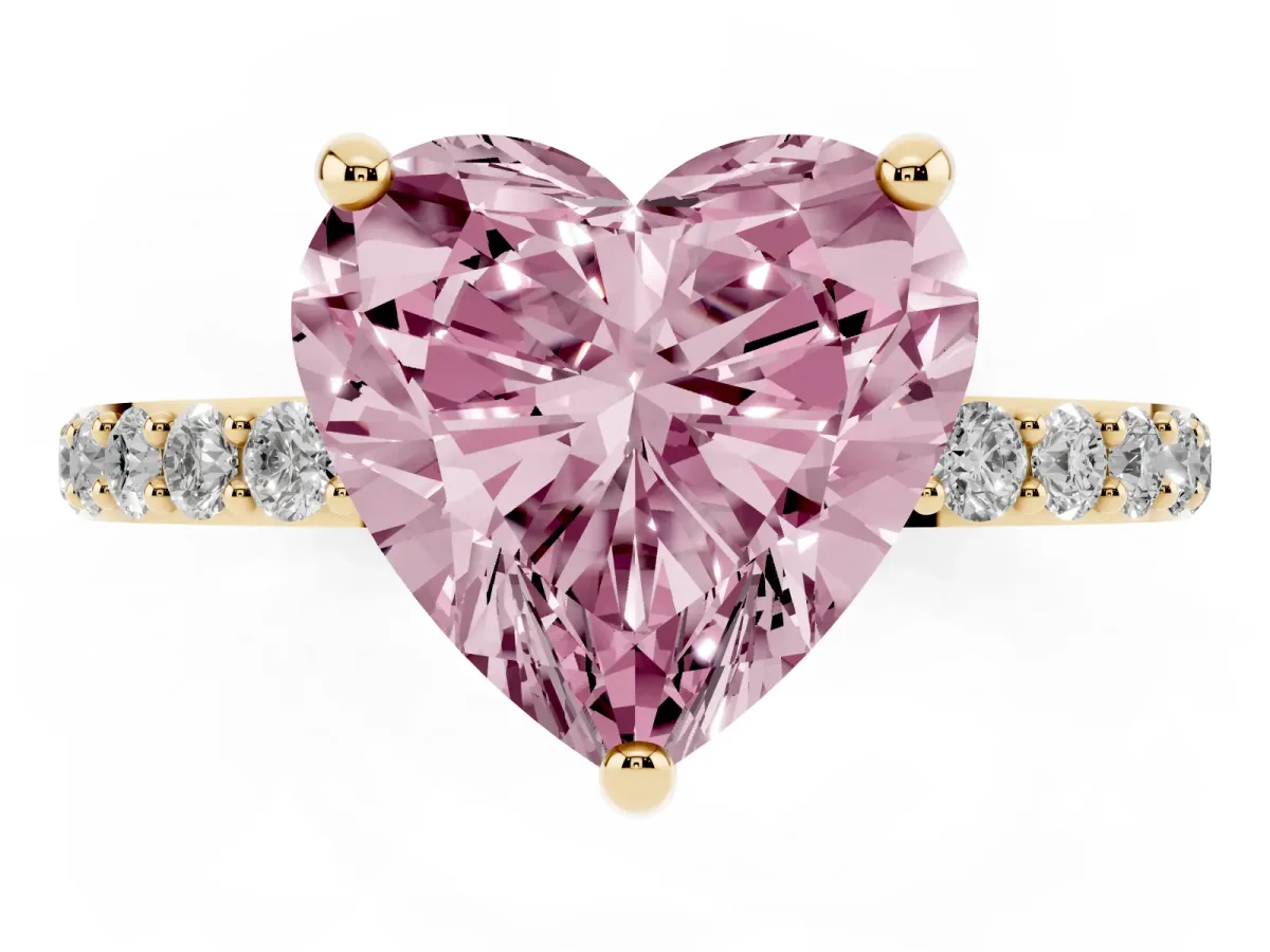 Fancy Pink Heart Cut Diamond Solitaire Ring with Round Pavé Band and Prong Setting Yellow gold