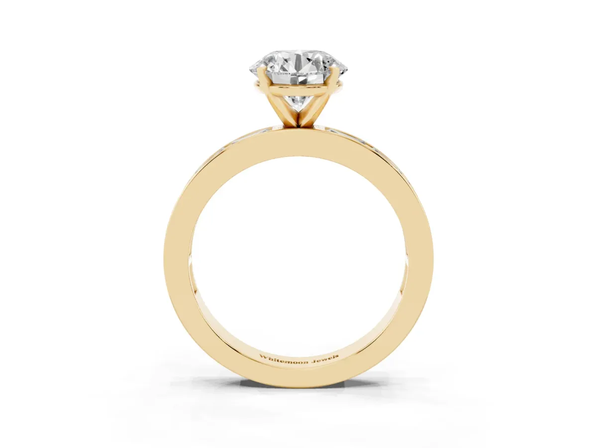 Round Cut Solitaire Diamond Ring with Channel-Set Baguette Band and Four-Prong Setting Yellow gold