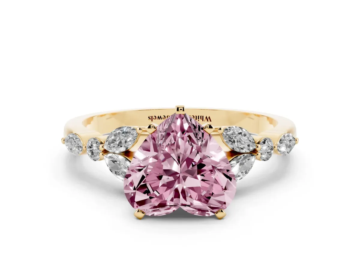 Fancy Pink Heart Cut Diamond Solitaire Ring with Side Stones and Four-Prong Setting Yellow gold