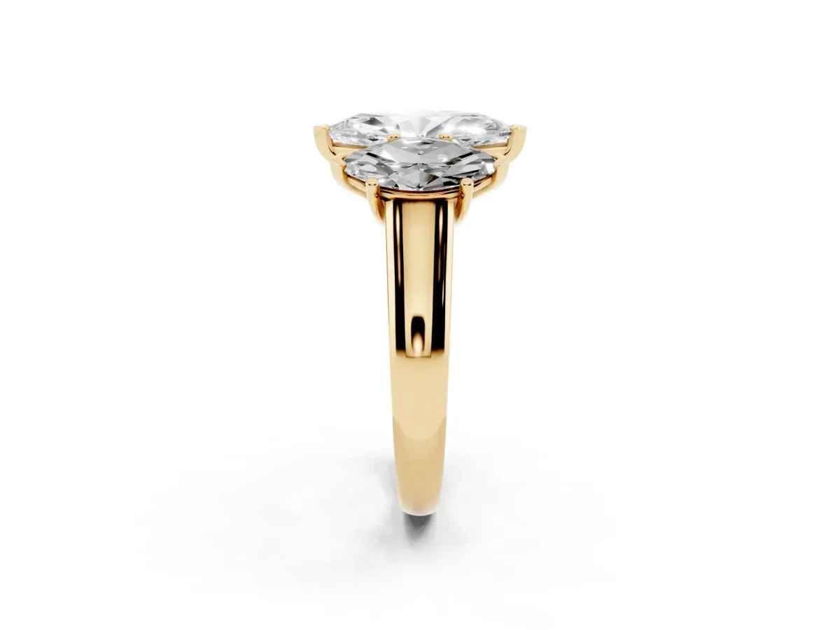 Marquise Cut Three-Stone Diamond Ring with Prong Setting on a Classic Band Yellow gold