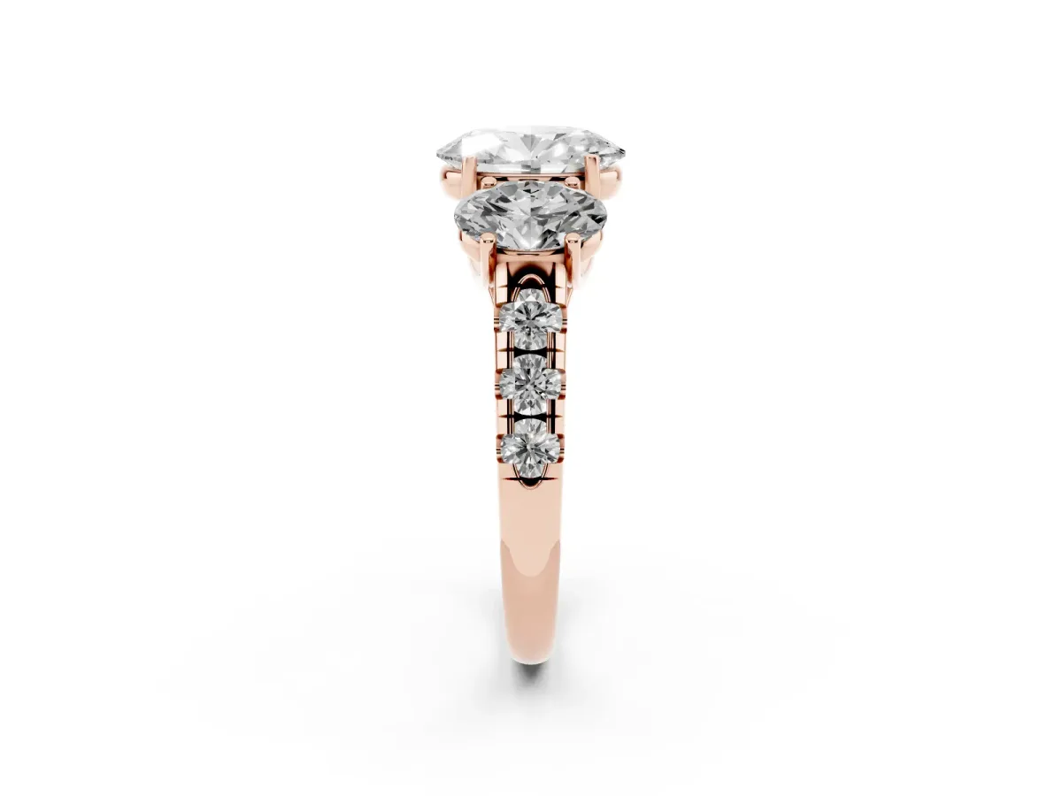 Three-Stone Oval Cut Diamond Pavé Band with Prong Setting Rose gold