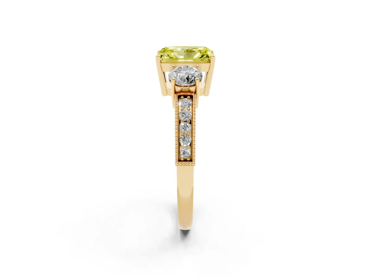 Fancy Yellow Radiant Cut Three-Stone Diamond Ring with Pavé Band and Four-Prong Setting Yellow gold