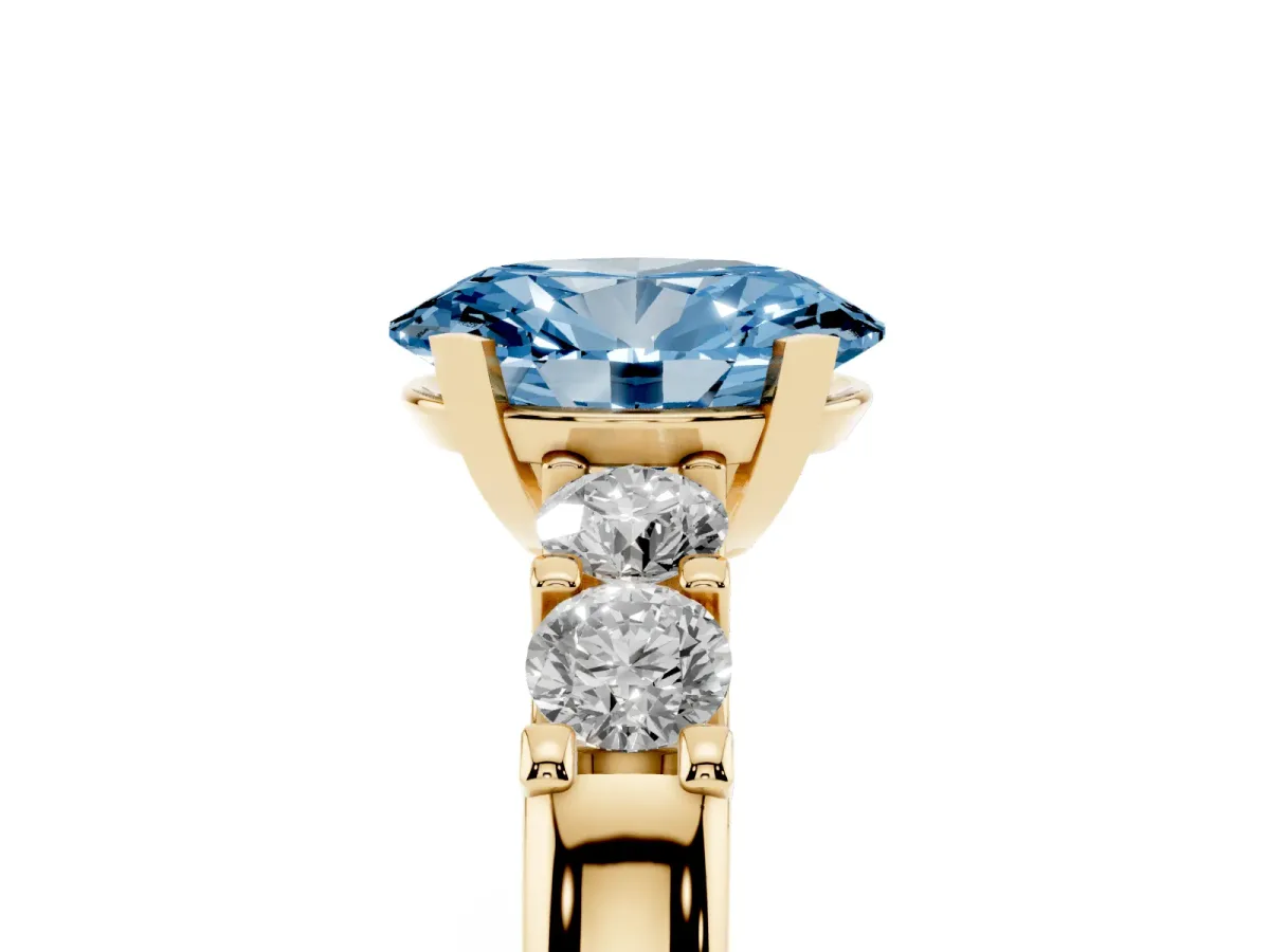 Fancy Blue Oval Cut Brilliant Cut Diamond Five-Stone Prong Set Engagement Ring with Channel Band Yellow gold
