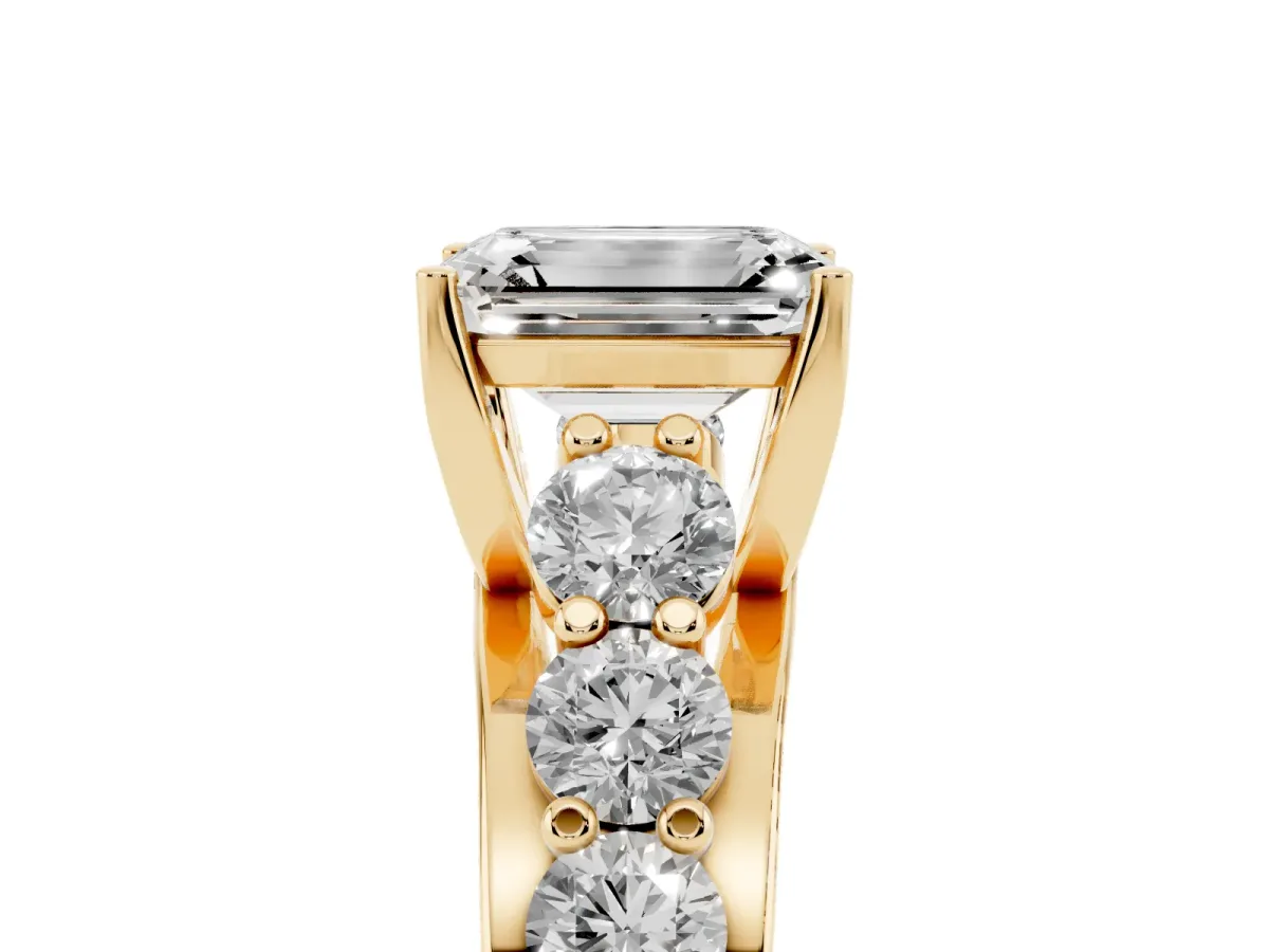 Emerald Cut Diamond Engagement Ring with Pavé Band and Four-Prong Setting Yellow gold
