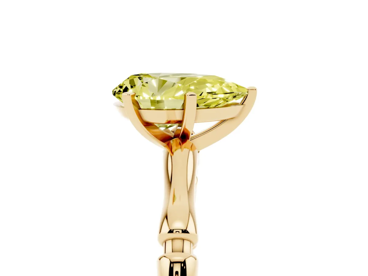 Fancy Yellow Pear Cut Solitaire Diamond Ring with Bamboo Band and Four-Prong Setting Yellow gold