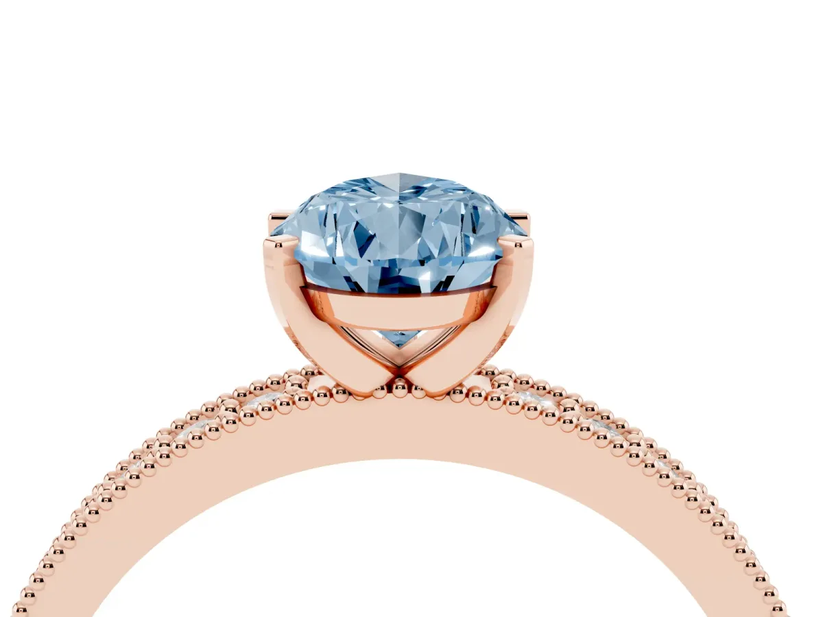 Fancy Blue Pear Cut Diamond Milgrain Pavé Engagement Ring with Four-Prong Setting Rose gold