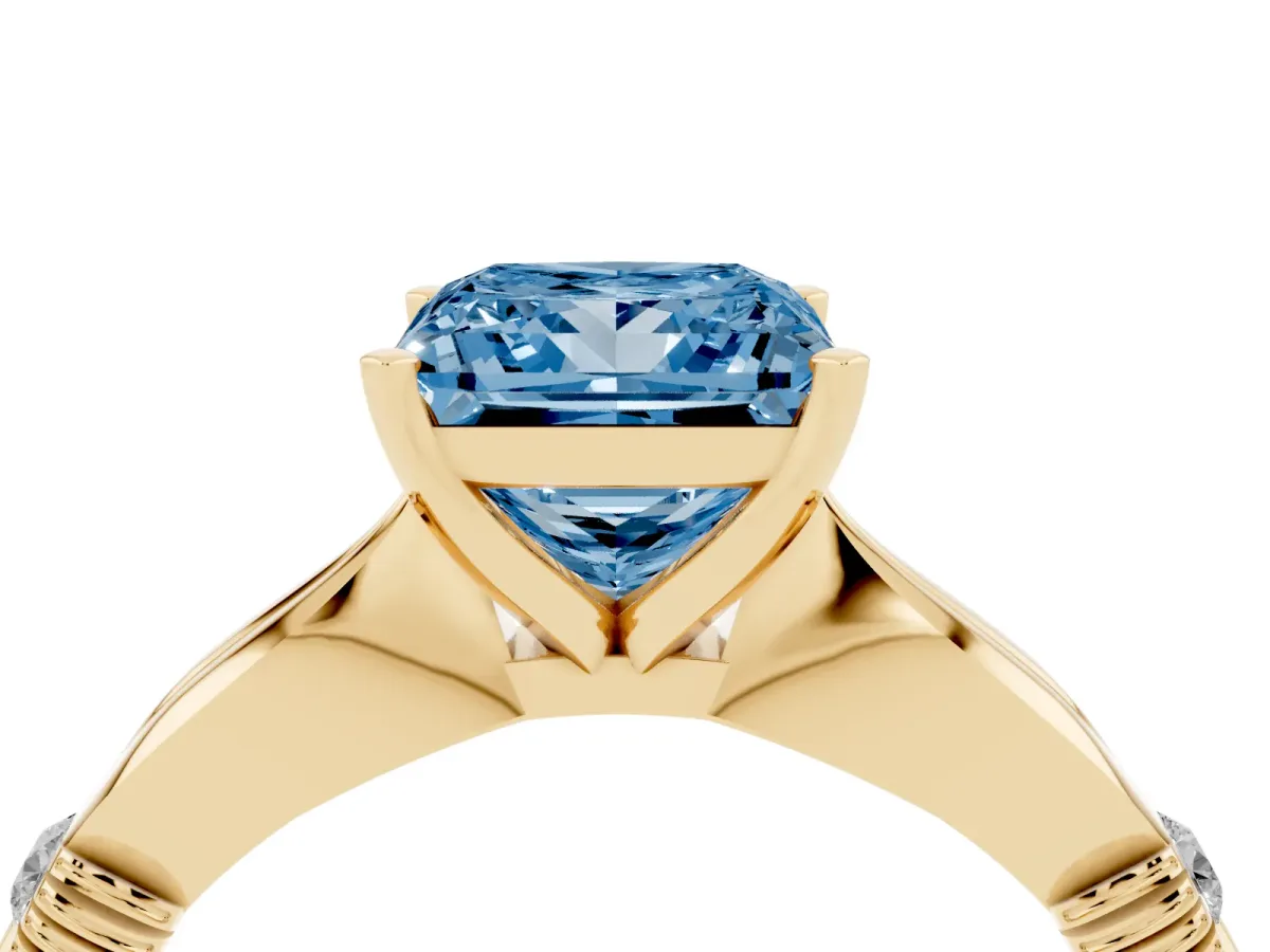 Fancy Blue Princess Cut Solitaire Diamond Twisted Band with Four-Prong Setting Yellow gold