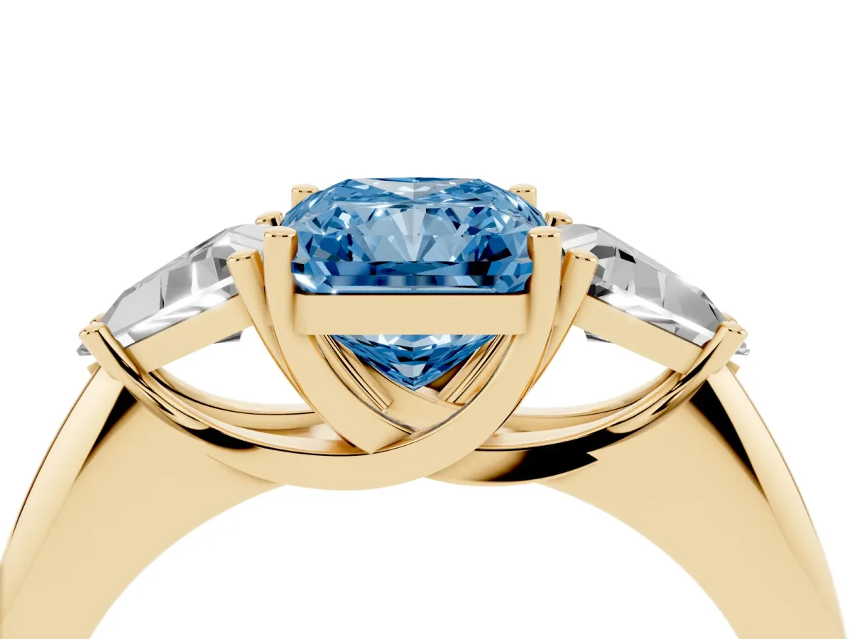 Fancy Blue Three-Stone Radiant Cut Diamond Engagement Ring with Trillion Side Stones and Prong Setting Yellow gold
