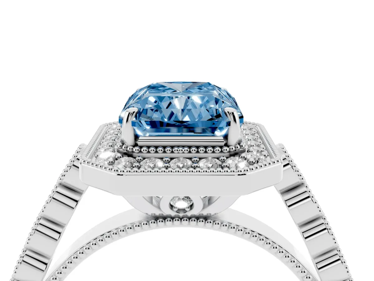 Fancy Blue Radiant Cut Halo Milgrain Solitaire with Bezel Set Side Stones and Pave Band White gold