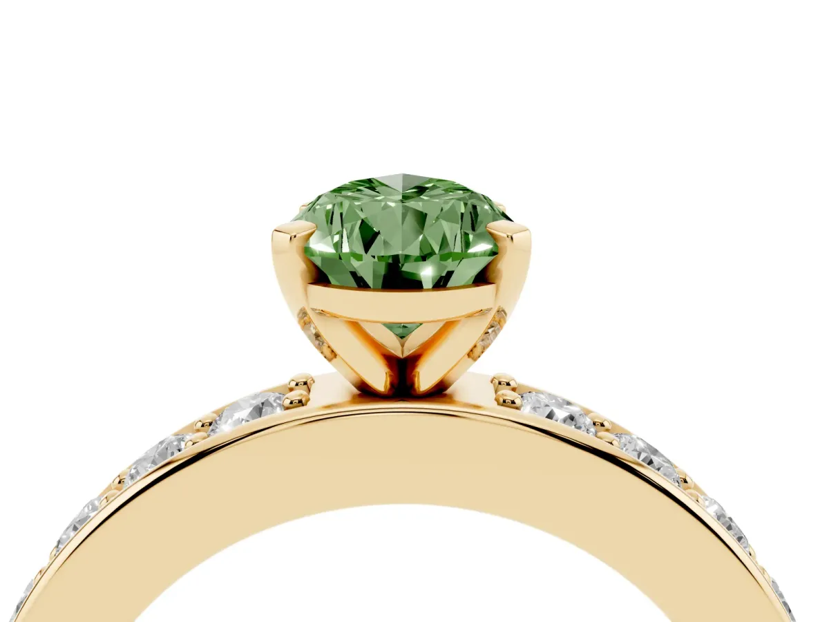 Fancy Green Pear Cut Diamond Engagement Ring with Channel Set Round Band and Prong Setting Yellow gold