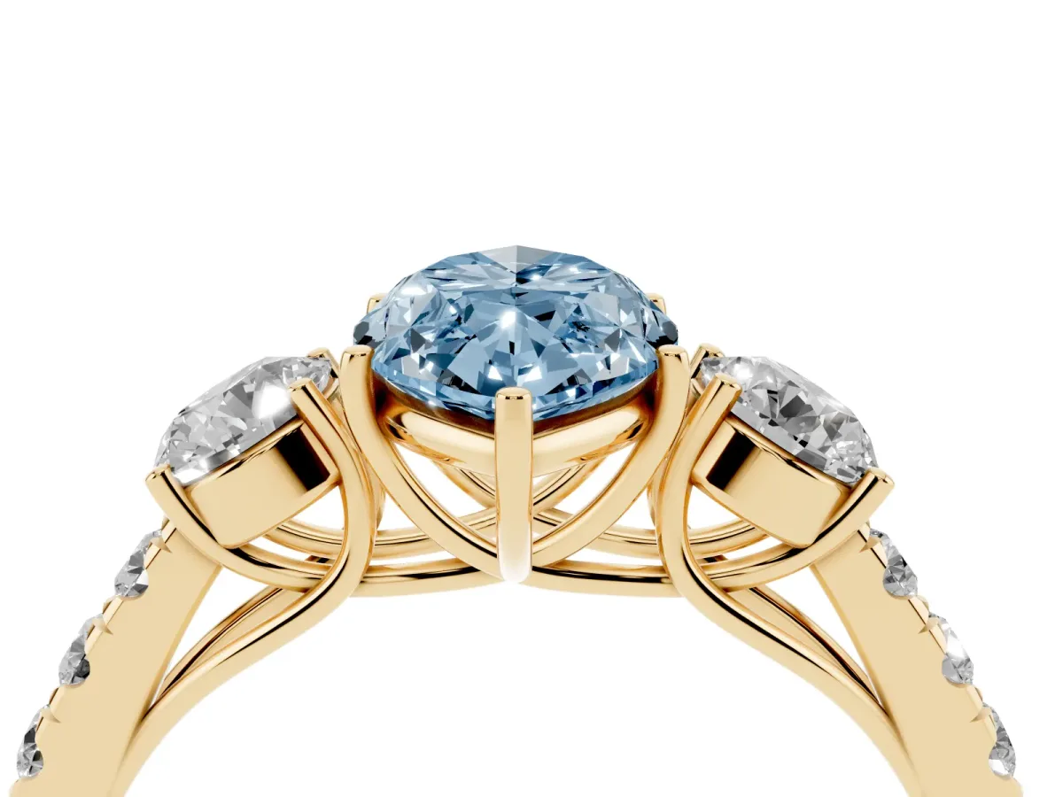 Fancy Blue Marquise Cut Cut Diamond Three-Stone Ring with Round Side Stones and Pavé Band Yellow gold