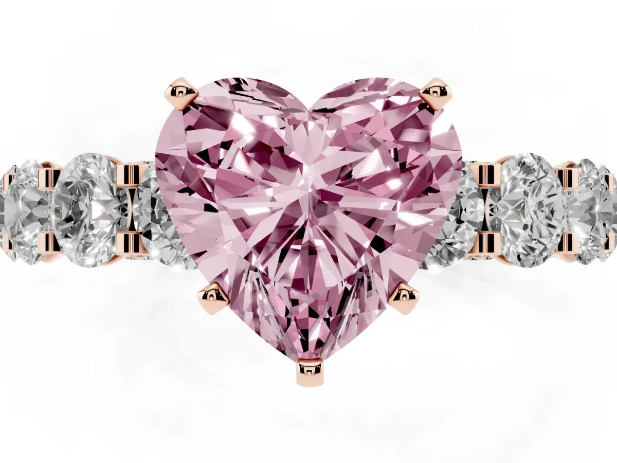 Fancy Pink Heart Cut Diamond Side Stone Engagement Ring with Four-Prong Setting Rose gold